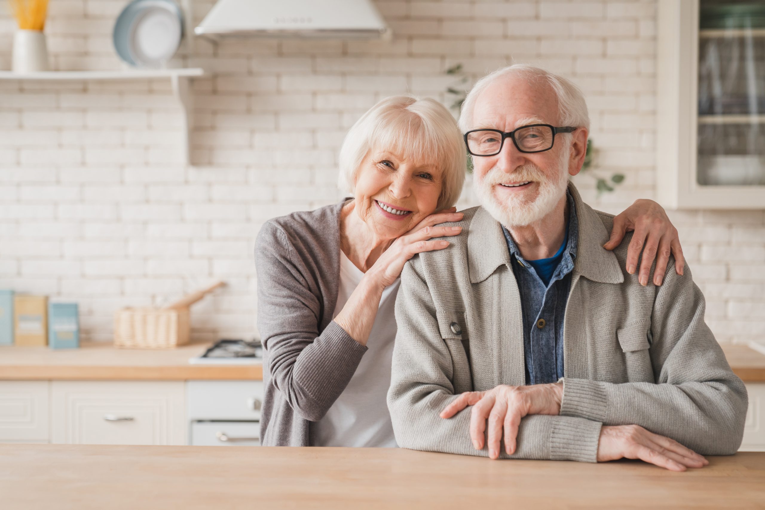 Old Couple smiling at camera 